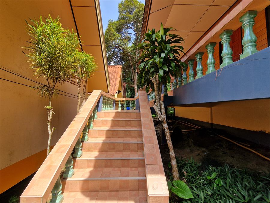 Stairs up to a stilt bungalow