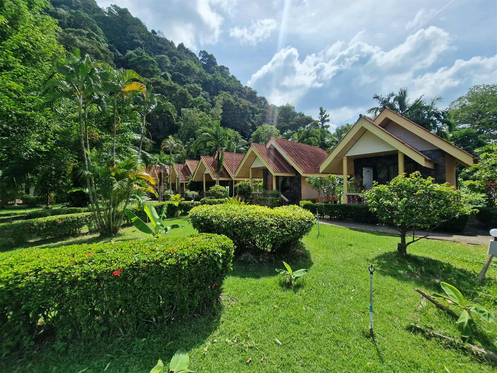 Bungalows in the garden below the jungle hill at Rim Khao